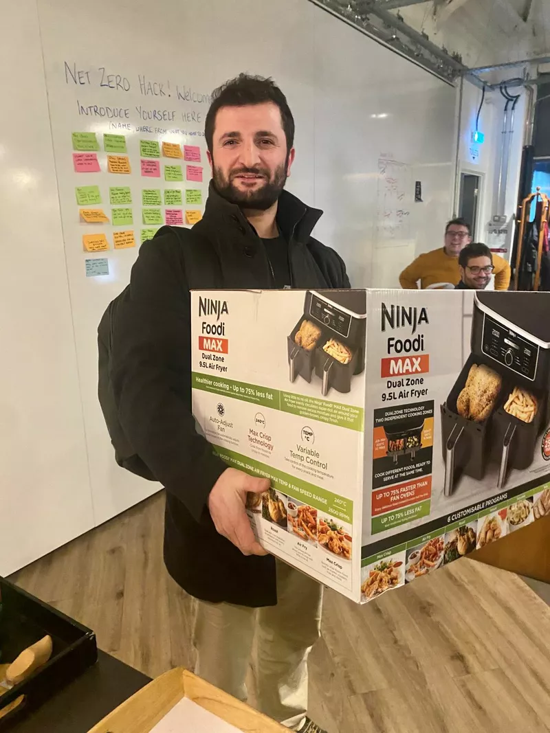 Participant with their prize air fryer