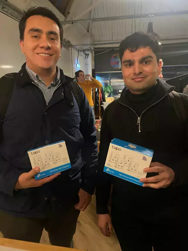 Participants with their prize smart wifi sockets